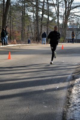 Frosty Runner Road Race
Runners who participated in the third annual Frosty Runner Road Race enjoyed spring-like weather, perfect for a 10 mile or 3 mile run through the neighborhoods of Rochester. The two separate races were run simultaneously, beginning and ending at Old Colony Regional Vocational Technical High School on Saturday February 1. The race was rescheduled from January 25, when the weather was a little too frosty for the event. Photo by Jean Perry
