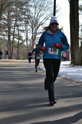 Frosty Runner Road Race
Runners who participated in the third annual Frosty Runner Road Race enjoyed spring-like weather, perfect for a 10 mile or 3 mile run through the neighborhoods of Rochester. The two separate races were run simultaneously, beginning and ending at Old Colony Regional Vocational Technical High School on Saturday February 1. The race was rescheduled from January 25, when the weather was a little too frosty for the event. Photo by Jean Perry
