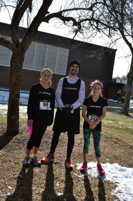 Frosty Runner Road Race
Runners who participated in the third annual Frosty Runner Road Race enjoyed spring-like weather, perfect for a 10 mile or 3 mile run through the neighborhoods of Rochester. The two separate races were run simultaneously, beginning and ending at Old Colony Regional Vocational Technical High School on Saturday February 1. The race was rescheduled from January 25, when the weather was a little too frosty for the event. Photo by Jean Perry
