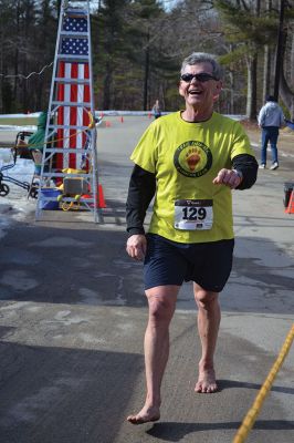 Frosty Runner Road Race
Runners who participated in the third annual Frosty Runner Road Race enjoyed spring-like weather, perfect for a 10 mile or 3 mile run through the neighborhoods of Rochester. The two separate races were run simultaneously, beginning and ending at Old Colony Regional Vocational Technical High School on Saturday February 1. The race was rescheduled from January 25, when the weather was a little too frosty for the event. Photo by Jean Perry
