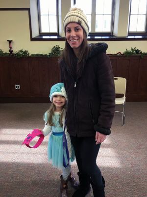 Frozen Princesses
On December 21, two princesses visited the Mattapoisett Public Library to read stories and sing songs from the Disney film Frozen. Princesses Elsa and Anna beguiled the children as well as their parents in an hour-long performance culminating in hugs and a photo session. The delightful event was sponsored by the Friends of the Mattapoisett Library. Photos by Marilou Newell
