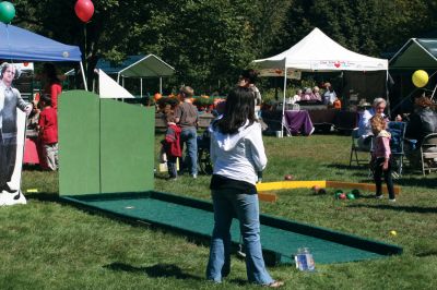 Grandparent's Day
It was a perfect autumn day for the SouthCoast Senior Resource Alliance Grandparents Day at Hiller Farm in Rochester on September 19. Children and their grandparents had fun playing bean-bag toss, bocce, posing with the Three Stooges, and more. The face-painting and petting zoo areas were a complete hit! Most importantly, the free event provided information to seniors on health services available in the SouthCoast area. Photo by Anne O'Brien-Kakley
