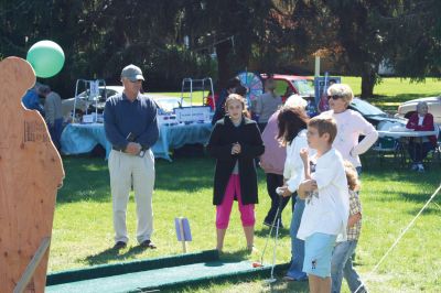 Grandparent's Day
It was a perfect autumn day for the SouthCoast Senior Resource Alliance Grandparents Day at Hiller Farm in Rochester on September 19. Children and their grandparents had fun playing bean-bag toss, bocce, posing with the Three Stooges, and more. The face-painting and petting zoo areas were a complete hit! Most importantly, the free event provided information to seniors on health services available in the SouthCoast area. Photo by Anne OBrien-Kakley
