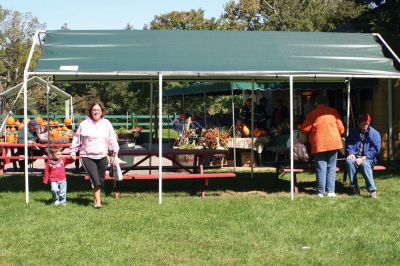 Grandparent's Day
It was a perfect autumn day for the SouthCoast Senior Resource Alliance Grandparents Day at Hiller Farm in Rochester on September 19. Children and their grandparents had fun playing bean-bag toss, bocce, posing with the Three Stooges, and more. The face-painting and petting zoo areas were a complete hit! Most importantly, the free event provided information to seniors on health services available in the SouthCoast area. Photo by Anne OBrien-Kakley
