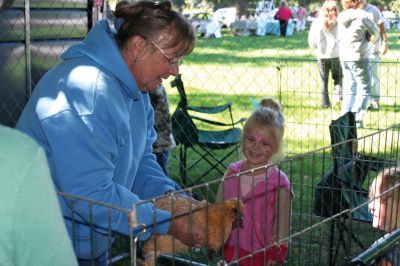 Grandparent's Day
It was a perfect autumn day for the SouthCoast Senior Resource Alliance Grandparents Day at Hiller Farm in Rochester on September 19. Children and their grandparents had fun playing bean-bag toss, bocce, posing with the Three Stooges, and more. The face-painting and petting zoo areas were a complete hit! Most importantly, the free event provided information to seniors on health services available in the SouthCoast area. Photo by Anne OBrien-Kakley
