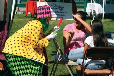 Grandparent's Day
It was a perfect autumn day for the SouthCoast Senior Resource Alliance Grandparents Day at Hiller Farm in Rochester on September 19. Children and their grandparents had fun playing bean-bag toss, bocce, posing with the Three Stooges, and more. The face-painting and petting zoo areas were a complete hit! Most importantly, the free event provided information to seniors on health services available in the SouthCoast area. Photo by Anne OBrien-Kakley
