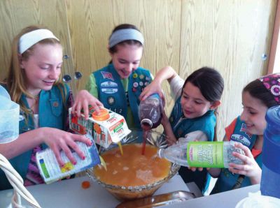 Senior Tea Party
The Junior Girl Scout Troop #85112 hosted the 6th annual Senior Tea Party at Village Court in Mattapoisett on May 23rd.  The seniors and Girl Scouts had a great time.  After the girls visited with the guests, they sang a few songs and played a few songs on their instruments.  Photo courtesy Heather Bichsel
