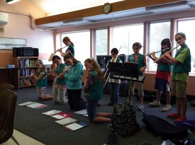 Senior Tea Party
The Junior Girl Scout Troop #85112 hosted the 6th annual Senior Tea Party at Village Court in Mattapoisett on May 23rd.  The seniors and Girl Scouts had a great time.  After the girls visited with the guests, they sang a few songs and played a few songs on their instruments.  Photo courtesy Heather Bichsel
