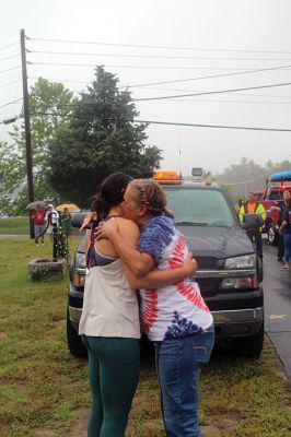 Gia Doonan
Gia Doonan was back home in Rochester on August 5, stopping in the village area during her Police and Fire escort to greet relatives and friends including her mother Liza en route to their Sarah Sherman Road home. Doonan, a Tabor Academy graduate, was a member of the United States Women's 8 rowing team, which finished out of the medal running by a mere 0.16 seconds in the July 29 medal race in the Tokyo Olympics. Photo by Mick Colageo
