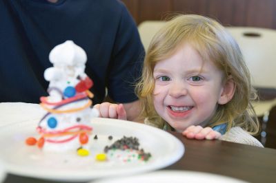 Gingerbread Houses
While others were out bustling on the last Saturday before Christmas, a couple dozen of the littler library patrons enjoyed the day making candy gingerbread houses at the Mattapoisett Free Public Library on Saturday, December 19.
