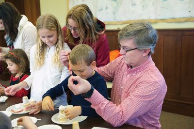 Gingerbread Houses
While others were out bustling on the last Saturday before Christmas, a couple dozen of the littler library patrons enjoyed the day making candy gingerbread houses at the Mattapoisett Free Public Library on Saturday, December 19.
