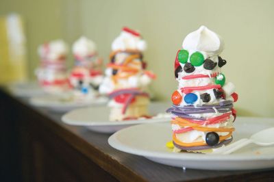 Gingerbread Houses
While others were out bustling on the last Saturday before Christmas, a couple dozen of the littler library patrons enjoyed the day making candy gingerbread houses at the Mattapoisett Free Public Library on Saturday, December 19.
