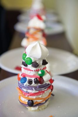 Gingerbread Houses
While others were out bustling on the last Saturday before Christmas, a couple dozen of the littler library patrons enjoyed the day making candy gingerbread houses at the Mattapoisett Free Public Library on Saturday, December 19.
