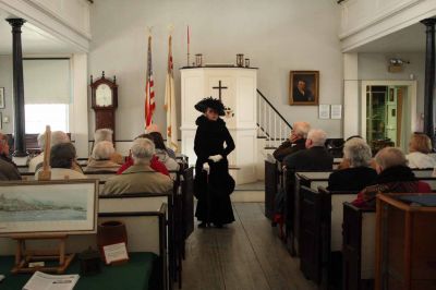 Hetty Green
The Mattapoisett Museum and Carriage House was the sight of a unique performance, on Sunday, March 22 as Lucy Bly played the part of Annie Leary as Ms. Leary reminisces after the loss of her friend Hetty Green. (Photo by Robert Chiarito)
