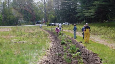 Greenways
On May 19, 2011, a group of volunteers from Rochester Green Ways converged on the corner of New Bedford Road and Dexter Lane to repair the damage done to their wildflower garden path by last springs flooding. The Green Ways Committee invites the public to use the path, to take the time to stop and smell the flowers, watch the butterflies and consider what a small group of volunteers can accomplish with community support. Photo courtesy of Laurene Gerrior.
