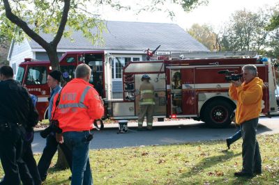 Disaster Drill
Fairhaven Fire Department hosted a full-scale exercise to improve emergency response in the region. Mattapoisett, Rochester, Dartmouth, Freetown, Acushnet, and New Bedford all responded to a disaster that simulated an accident between a school bus and an oil truck at Livesey Park in Fairhaven. Twenty drama students from New Bedford Vocational High School played the part of injured students who were assessed and treated for injuries. Photo by Anne OBrien-Kakley.
