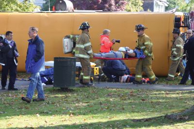 Disaster Drill
Fairhaven Fire Department hosted a full-scale exercise to improve emergency response in the region. Mattapoisett, Rochester, Dartmouth, Freetown, Acushnet, and New Bedford all responded to a disaster that simulated an accident between a school bus and an oil truck at Livesey Park in Fairhaven. Twenty drama students from New Bedford Vocational High School played the part of injured students who were assessed and treated for injuries. Photo by Anne OBrien-Kakley.
