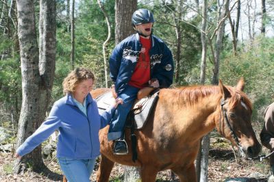 Helping Hands and Hooves
Helping Hands and Hooves, a Mattapoisett-based non-profit organization in the area of Aucoot Cove, gives horseback riding lessons to disabled people in the Southcoast region. The rides are therapeutic to the students, who anticipate their lessons each week so much that they even hold the rides in the rain. Photo by Anne OBrien-Kakley.
