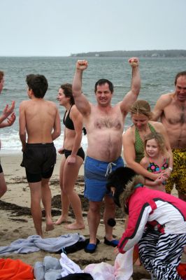 Christmas Day Swim
Helping Hands and Hooves hosed their 11th annual Christmas Day Swim at 11:00 am at the Mattapoisett Town Beach. Helping Hands and Hooves is a non-profit (based in Mattapoisett) that is dedicated to providing therapeutic horseback riding lessons for adults with disabilities. If you would like to learn more about Helping Hands and Hooves you can visit their website at www.helpinghandsandhooves.org. Photo by Robert Chiarito
