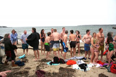 Christmas Day Swim
Helping Hands and Hooves hosed their 11th annual Christmas Day Swim at 11:00 am at the Mattapoisett Town Beach. Helping Hands and Hooves is a non-profit (based in Mattapoisett) that is dedicated to providing therapeutic horseback riding lessons for adults with disabilities. If you would like to learn more about Helping Hands and Hooves you can visit their website at www.helpinghandsandhooves.org. Photo by Robert Chiarito
