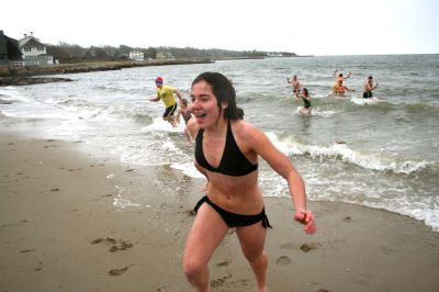 Christmas Day Swim
Helping Hands and Hooves hosed their 11th annual Christmas Day Swim at 11:00 am at the Mattapoisett Town Beach. Helping Hands and Hooves is a non-profit (based in Mattapoisett) that is dedicated to providing therapeutic horseback riding lessons for adults with disabilities. If you would like to learn more about Helping Hands and Hooves you can visit their website at www.helpinghandsandhooves.org. Photo by Robert Chiarito
