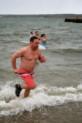 Christmas Day Swim
Helping Hands and Hooves hosed their 11th annual Christmas Day Swim at 11:00 am at the Mattapoisett Town Beach. Helping Hands and Hooves is a non-profit (based in Mattapoisett) that is dedicated to providing therapeutic horseback riding lessons for adults with disabilities. If you would like to learn more about Helping Hands and Hooves you can visit their website at www.helpinghandsandhooves.org. Photo by Robert Chiarito
