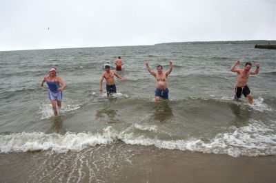 Christmas Day Swim
Helping Hands and Hooves hosed their 11th annual Christmas Day Swim at 11:00 am at the Mattapoisett Town Beach. Helping Hands and Hooves is a non-profit (based in Mattapoisett) that is dedicated to providing therapeutic horseback riding lessons for adults with disabilities. If you would like to learn more about Helping Hands and Hooves you can visit their website at www.helpinghandsandhooves.org. Photo by Robert Chiarito
