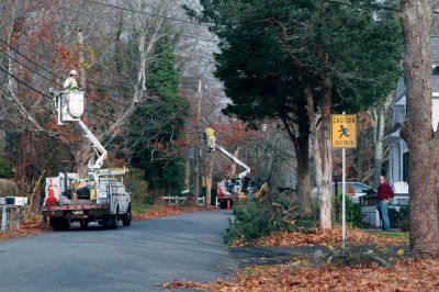 Journey's End
Trees were trimmed along Brant Beach Avenue, and N Star worked with Comcast to bring some power lines down so the Francoeur house could be placed onto its new foundation on November 10, 2009. Debbie Francoeur and her son Isaac have t-shirts and hats available for those wishing to purchase a keepsake of the move. Photo by Anne O'Brien-Kakley.
