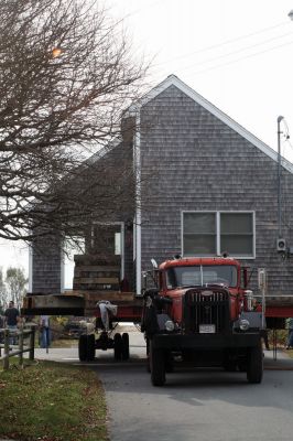 Journey's End
Trees were trimmed along Brant Beach Avenue, and N Star worked with Comcast to bring some power lines down so the Francoeur house could be placed onto its new foundation on November 10, 2009. Debbie Francoeur and her son Isaac have t-shirts and hats available for those wishing to purchase a keepsake of the move. Photo by Anne O'Brien-Kakley.
