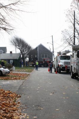 Journey's End
Trees were trimmed along Brant Beach Avenue, and N Star worked with Comcast to bring some power lines down so the Francoeur house could be placed onto its new foundation on November 10, 2009. Debbie Francoeur and her son Isaac have t-shirts and hats available for those wishing to purchase a keepsake of the move. Photo by Anne O'Brien-Kakley.
