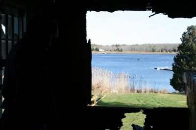 Historic Fire
A view of the Weweantic River emptying into Buzzards Bay is a beautiful contrast to the burnt, raw edges of the damaged section on the house.
