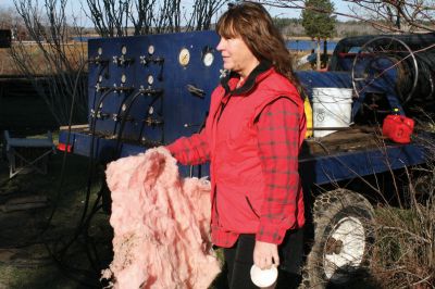 Historic Fire
Susan Dexter chased this piece of insulation before the wind took it into the Weweantic River. The fire left a mess of insulation, siding, broken glass and other debris, in close proximity to the River and Buzzards Bay.
