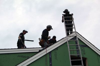 Buzzards Bay Area Habitat for Humanity
On Friday, a local mother and her two daughters were the beneficiaries of a new roof on their Route 6 house after Buzzards Bay Area Habitat for Humanity resumed its first home build in Mattapoisett. The project had been delayed by the COVID-19 pandemic. See story. Photos by Mick Colageo
