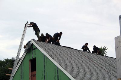 Buzzards Bay Area Habitat for Humanity
On Friday, a local mother and her two daughters were the beneficiaries of a new roof on their Route 6 house after Buzzards Bay Area Habitat for Humanity resumed its first home build in Mattapoisett. The project had been delayed by the COVID-19 pandemic. See story. Photos by Mick Colageo
