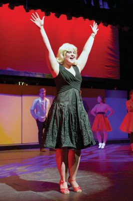 Hairspray at Tabor Academy
Hairspray, the musical, is coming to Tabor Academy’s Fireman Center for the Performing Arts in Hoyt Hall in Marion. Hannah Rolighed stars as lead role Tracey Turnblad who transforms her life through dance and determination, while also transforming her hometown of Baltimore by challenging segregation and racism. The production runs from February 19 to February 21. Photos by Colin Veitch
