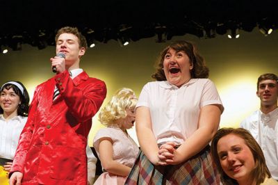 Hairspray at Tabor Academy
Hairspray, the musical, is coming to Tabor Academy’s Fireman Center for the Performing Arts in Hoyt Hall in Marion. Hannah Rolighed stars as lead role Tracey Turnblad who transforms her life through dance and determination, while also transforming her hometown of Baltimore by challenging segregation and racism. The production runs from February 19 to February 21. Photos by Colin Veitch
