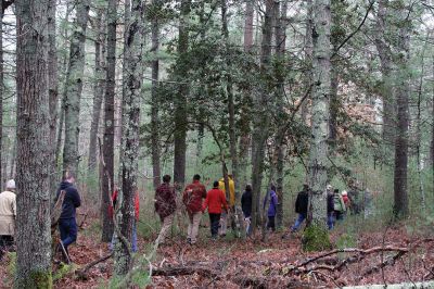 Hammond Quarry
Mattapoisett Land Trust President Mike Huguenin led a group of about 52 people on a walk about Hammond Quarry, a historical property off Mattapoisett Neck Road that the MLT is hoping to acquire next year. Pink granite was mined from the site between the early 1700s through the early 1900s, and the MLT plans to purchase the property to preserve the quarries and carve out trails for public access. Photos by Jean Perry
