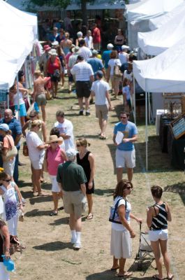 Harbor Craze
The town gazebo was the scene of another sultry Harbor Days this past weekend. Rows of vendors peddled their fun wares while visitors of all ages enjoyed music, conversation and the best strawberry shortcake in the world. The festivities started in earnest on Friday night with chowder and seafood rolls, and continued until Sunday. Only 51 more weeks until Harbor Days 2011! Photos by Felix Perez.
