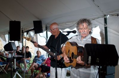 Harbor Days Craze
The town gazebo was the scene of another sultry Harbor Days this past weekend. Rows of vendors peddled their fun wares while visitors of all ages enjoyed music, conversation and the best strawberry shortcake in the world. The festivities started in earnest on Friday night with chowder and seafood rolls, and continued until Sunday. Only 51 more weeks until Harbor Days 2011! Photos by Felix Perez.
