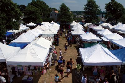 Harbor Days Craze
The town gazebo was the scene of another sultry Harbor Days this past weekend. Rows of vendors peddled their fun wares while visitors of all ages enjoyed music, conversation and the best strawberry shortcake in the world. The festivities started in earnest on Friday night with chowder and seafood rolls, and continued until Sunday. Only 51 more weeks until Harbor Days 2011! Photos by Felix Perez.
