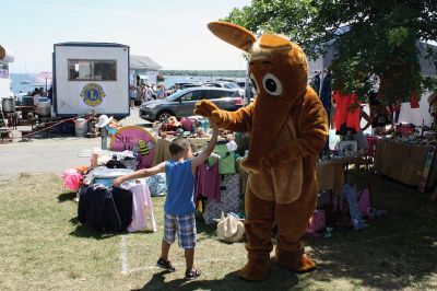 Harbor Days 
Harbor Days came to Mattapoisett this past weekend, and many visitors were gracious enough to spin The Wanderer Wheel for a $1 donation to the Lions Club. Those who played helped raise an extra $523 the Lions Club will use to benefit the community. The Aardvark came out too, but since furry aardvarks hate hot weather, he only made a couple of appearances. Photos by Jean Perry
