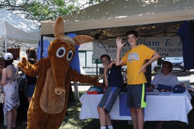 Harbor Days 
Harbor Days came to Mattapoisett this past weekend, and many visitors were gracious enough to spin The Wanderer Wheel for a $1 donation to the Lions Club. Those who played helped raise an extra $523 the Lions Club will use to benefit the community. The Aardvark came out too, but since furry aardvarks hate hot weather, he only made a couple of appearances. Photos by Jean Perry
