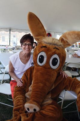 Harbor Days 
Harbor Days came to Mattapoisett this past weekend, and many visitors were gracious enough to spin The Wanderer Wheel for a $1 donation to the Lions Club. Those who played helped raise an extra $523 the Lions Club will use to benefit the community. The Aardvark came out too, but since furry aardvarks hate hot weather, he only made a couple of appearances. Photos by Jean Perry
