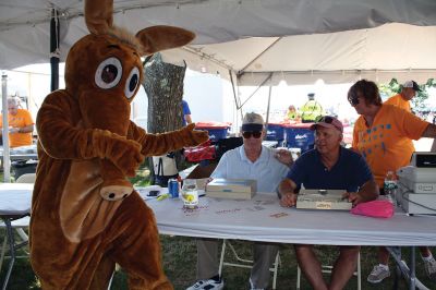 Harbor Days 
Harbor Days came to Mattapoisett this past weekend, and many visitors were gracious enough to spin The Wanderer Wheel for a $1 donation to the Lions Club. Those who played helped raise an extra $523 the Lions Club will use to benefit the community. The Aardvark came out too, but since furry aardvarks hate hot weather, he only made a couple of appearances. Photos by Jean Perry
