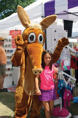 Harbor Days 
Harbor Days came to Mattapoisett this past weekend, and many visitors were gracious enough to spin The Wanderer Wheel for a $1 donation to the Lions Club. Those who played helped raise an extra $523 the Lions Club will use to benefit the community. The Aardvark came out too, but since furry aardvarks hate hot weather, he only made a couple of appearances. Photos by Jean Perry
