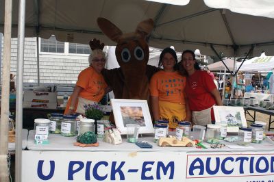 Harbor Days 
Harbor Days came to Mattapoisett this past weekend, and many visitors were gracious enough to spin The Wanderer Wheel for a $1 donation to the Lions Club. Those who played helped raise an extra $523 the Lions Club will use to benefit the community. The Aardvark came out too, but since furry aardvarks hate hot weather, he only made a couple of appearances. Photos by Jean Perry
