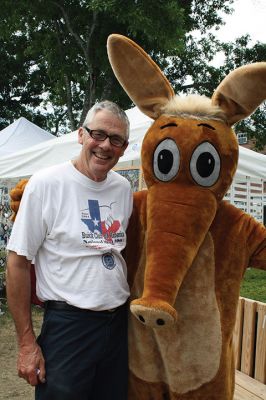 Harbor Days 
Harbor Days came to Mattapoisett this past weekend, and many visitors were gracious enough to spin The Wanderer Wheel for a $1 donation to the Lions Club. Those who played helped raise an extra $523 the Lions Club will use to benefit the community. The Aardvark came out too, but since furry aardvarks hate hot weather, he only made a couple of appearances. Photos by Jean Perry
