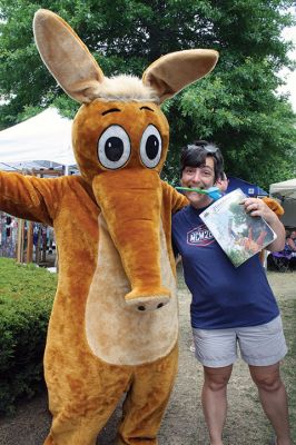 Harbor Days 
Harbor Days came to Mattapoisett this past weekend, and many visitors were gracious enough to spin The Wanderer Wheel for a $1 donation to the Lions Club. Those who played helped raise an extra $523 the Lions Club will use to benefit the community. The Aardvark came out too, but since furry aardvarks hate hot weather, he only made a couple of appearances. Photos by Jean Perry
