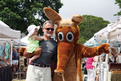 Harbor Days 
Harbor Days came to Mattapoisett this past weekend, and many visitors were gracious enough to spin The Wanderer Wheel for a $1 donation to the Lions Club. Those who played helped raise an extra $523 the Lions Club will use to benefit the community. The Aardvark came out too, but since furry aardvarks hate hot weather, he only made a couple of appearances. Photos by Jean Perry
