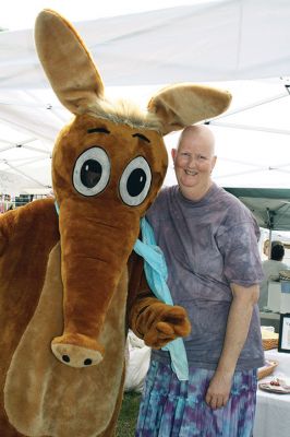 Harbor Days 
Harbor Days came to Mattapoisett this past weekend, and many visitors were gracious enough to spin The Wanderer Wheel for a $1 donation to the Lions Club. Those who played helped raise an extra $523 the Lions Club will use to benefit the community. The Aardvark came out too, but since furry aardvarks hate hot weather, he only made a couple of appearances. Photos by Jean Perry
